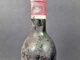 a bottle of wine that is sitting on a table