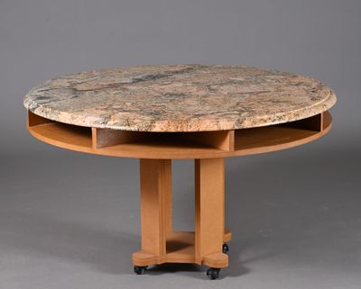 an image of a round table with a marble top on casteors