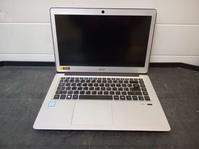 a laptop that is sitting on the floor