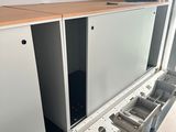 a room with a bunch of cabinets in it
