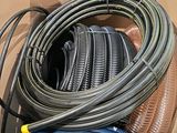 a box full of different types of hoses and hoses