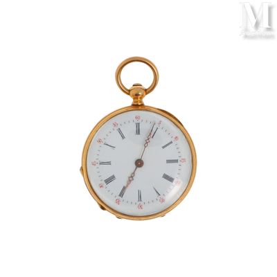 une montre de poche en or avec des chiffres romains sur le cadran