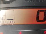 a close up of a car ' s dashboard with a clock on it