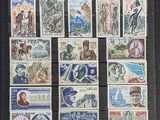 a lot of stamps that are on the table