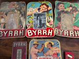 many different types of advertising signs on the table
