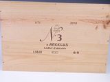 a close up of a wooden box with a label on it