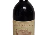 a bottle of wine that is sitting on a table