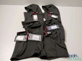 three pairs of men ' s black pants with tags on them