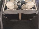 two seats in the back of a car that is empty