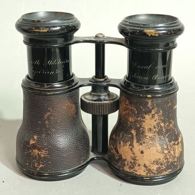 a close up of a pair of binoculars on a table
