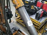 a picture of a pile of construction equipment in a warehouse