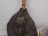 a picture of a baseball bat and a baseball glove on a table