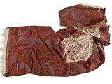 a red scarf with a paisley design on it