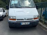 a white van that is parked on the side of the road