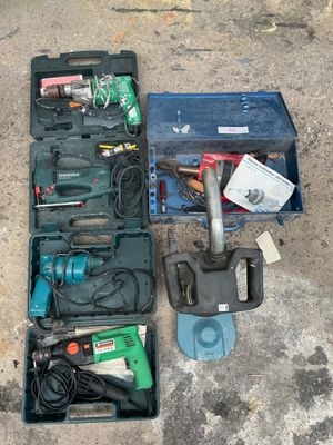 many tools in the case on the concrete floor