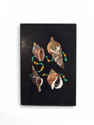 a painting of seashells on a black background