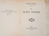 an open book with a picture of a cat on it