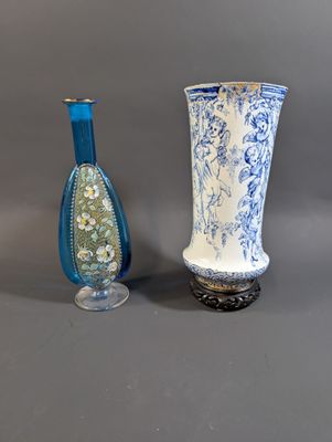 two vases sitting next to each other on a table