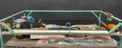 a table with a lot of tools on top of it