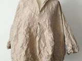 une photo d'un mannequin vêtu d'une chemise
