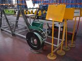 a machine that is sitting on a cart in a warehouse