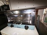 a toaster oven that is sitting on top of a counter