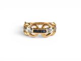 a close up of a gold ring with a blue stone in the middle