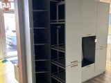 an image of a kitchen with a tv in the middle of it