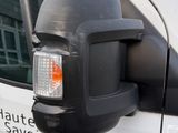an image of a side view mirror of a van