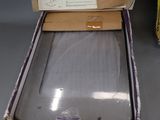 a box with a laptop inside of it on a table