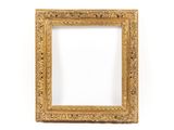 an antique gold frame with a white background