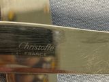 a close up of a knife that is on a cloth