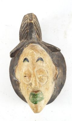 a small statue of a man with a hat on it
