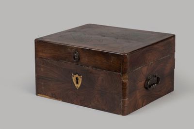 an old wooden box with a lock on the inside