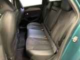 the back seat of a car with a seat belt in it