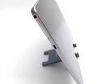 a close up view of a tablet computer on a stand