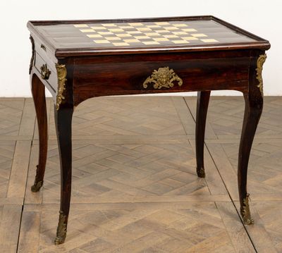 a small table with a chess board on top of it