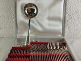 silverware in a silver case with a spoon and fork inside of it