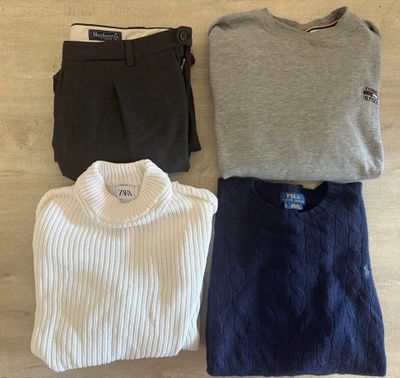 three pieces of clothing laid out on a wooden floor