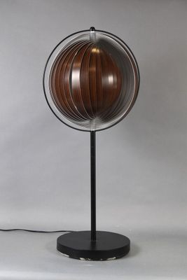 an image of a table lamp with a wooden sphere on a metal stand