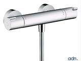 a close up of a shower faucet on a pole on a white background