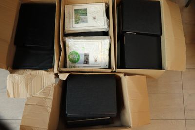 a cardboard box with a bunch of electronic equipment inside of it