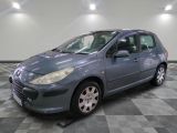 a picture of a blue car parked in a garage