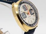 an image of a close up of a watch on a white surface