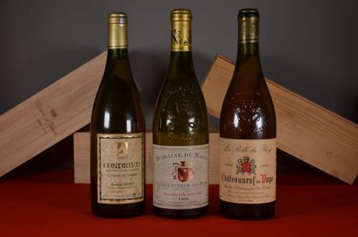 three bottles of wine sitting next to each other on a table