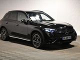 the mercedes gle suv is parked on a checkered floor