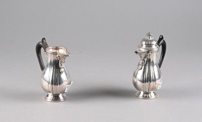pair of silver plated sugar and pepper shakers
