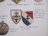 a lot of different badges on a piece of paper