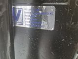 a close up of a car door with a sticker on it