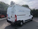 a white van that is parked in a parking lot
